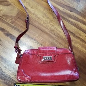 Red leather purse, shoulder strap, dividers,pocket